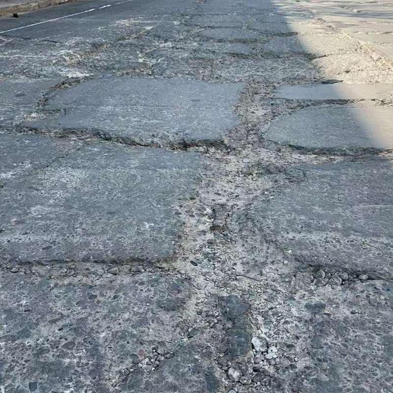 龙沙路面起砂露石子修补料